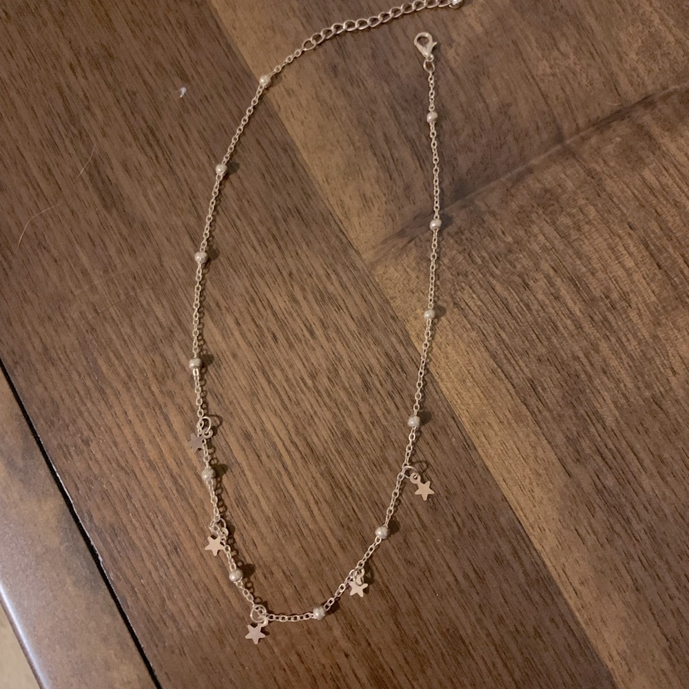 Dainty gold star necklace